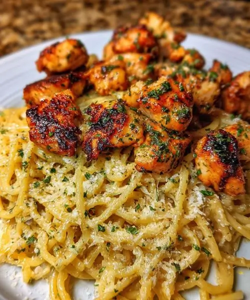 Chicken Bites over Parmesan Spaghetti