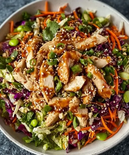Healthy Asian Chicken Crunch Salad with sesame dressing and fresh vegetables Title Attribute: Healthy Asian Chicken Crunch Salad Recipe